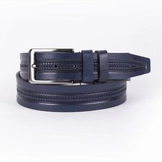 "Introducing our Navy Blue Men's Belt for Suit, a sophisticated accessory designed to complement your formal attire with elegance and style. This belt is a testament to craftsmanship and quality, featuring a unique laser-cut design that sets it apart from traditional dress belts. Made from genuine Italian leather, it offers both durability and a luxurious feel, ensuring you look polished and put-together at any formal event or business meeting. The navy blue color of the belt adds a touch of mod Luxury Blue Belt For Formal Occasions, Luxury Blue Formal Belt, Elegant Blue Leather Belt, Dress Belts, Mens Belt, Laser Cut Leather, Men's Belt, Dress Belt, Lasercut Design