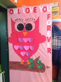 a pink door decorated with an owl on a branch and the words owl love you forever