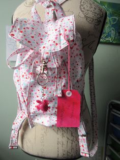 "Adult sized mini backpack bag 11x12\" White lining Adjustable straps  Length 41\" Width 1\" Keychain included One outside pocket Drawstring closure D ring lobster clasp closure Cotton fabric Metal hardware mixed -care- Hand wash spot clean / air dry only" White Backpack With Adjustable Strap As Gift, Cute Adjustable Backpack For Everyday Use, Pink Backpack With Adjustable Strap As Gift, Cute Backpack With Adjustable Strap As Gift, Cute Summer Backpack For Everyday Use, Cute Summer Backpack, Backpack Bag, Des Moines, Clean Air