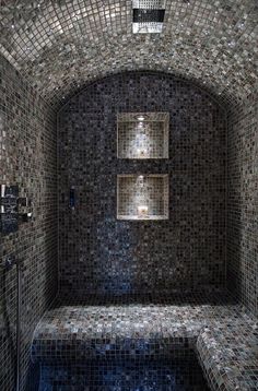 a very nice looking bathroom with some tile on the walls