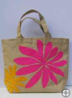 a bag with pink and yellow flowers on it