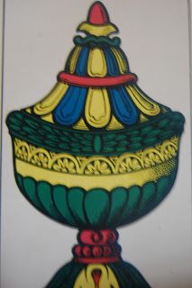 a drawing of a vase on a white background with red, yellow and blue accents