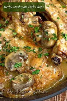 a pan filled with meat covered in mushrooms