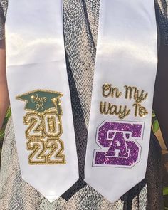 two white and gold graduation sashes with the words on my way to 2012