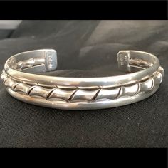 This Is A Vintage Sterling Silver Mexico Handmade And Signed Cuff Bracelet. It Is Beautifully Handcrafted With A Unique Twist Design In The Center. It Is Stamped Te-51, Mexico, And 925. It Is Approximately 2&6/8 “ In Diameter, And Approximately 26.6 Grams. My Father Purchased This In Mexico In Or Around The 70’s. Designer Cuff Bracelet For Anniversary, Unique Sterling Silver Cuff Bracelet For Formal Occasions, Classic Sterling Silver Cuff Bracelet For Formal Occasions, Sterling Silver Cuff Bracelet, Adjustable For Formal Occasions, My Father, Jewelry Vintage, Vintage Sterling Silver, Womens Jewelry Bracelets, Cuff Bracelet