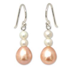 Sweetly feminine cultured pearls grace these earrings by Matta. She combines two white globes with a pale peach teardrop to dance on silver hooks. .925 Sterling silver Paw Print Jewelry, Ribbon Jewelry, Pale Peach, Pearl Dangle Earrings, Printed Jewelry, Pearl Earrings Dangle, Beaded Dangle Earrings, Jewelry Packaging, Elegant Earrings