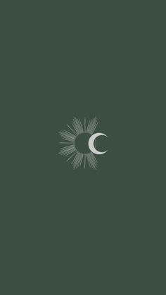 the sun and moon are seen in this dark green background