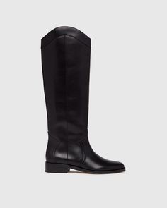 Raina is our take on the classic riding boot. Crafted from a super durable yet luxuriously soft black leather, this timeless straight shaft tall boot is designed with a curved topline that dips at the front and back for a flattering look, western-inspired pattern and stitch detailing, an extended leather welt with tonal stitch details, and a black leather stacked 20mm heel for a slight amount of lift. The classic menswear-inspired details on the outsole include stitching and half toplift for an Classic Tall Black Boots, Black Leather Tall Boots, Tall Black Leather Heeled Boots, Black Leather Boots Knee High Under $150, Black Knee-high Moto Boots Medium Width, Black Boots Tall, Men Store, Shoes Boots Ankle, Denim Shoes