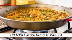 a pan filled with food sitting on top of a stove next to a burner