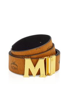 Available in a variety of colorful options to complete any look, this sleek leather belt from Mcm features a polished M-buckle and a reversible design with a logo-stamped interior. Mcm Belt, Ties Mens Fashion, Mens Belt, Expensive Jewelry Luxury, Pelo Afro, Designer Belt, Reversible Belt, Expensive Jewelry, Men Style Tips