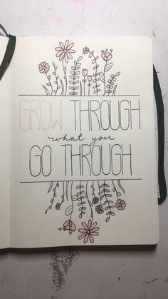 an open notebook with the words grow through and go through