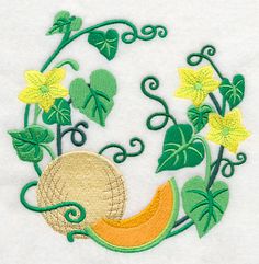 an embroidered design with green leaves and yellow flowers in the center on a white shirt