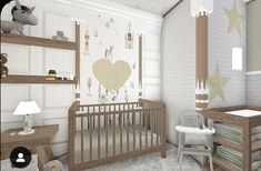 a baby's room is decorated in neutral colors