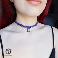 Natural rose quartz gemstone, knotted in a purple beaded macrame choker. This handmade macrame necklace is made with wax thread in a deep purple color that compliments the pink quartz stone, and is decorated with silver beads and purple crystals all around. This adjustable choker necklace would make a perfect gift for a mother or a friend that loves rose quartz stones. The macrame necklace is adjustable with a slide knot so it can fit anyone perfectly. It looks perfect alone or layered with your Adjustable Beaded Purple Choker, Adjustable Purple Beaded Choker, Purple Adjustable Handmade Choker, Handmade Adjustable Lavender Jewelry, Handmade Purple Bohemian Choker, Handmade Bohemian Purple Choker, Handmade Adjustable Lavender Beaded Necklaces, Handmade Lavender Beaded Necklaces, Bohemian Purple Jewelry With Adjustable Cord