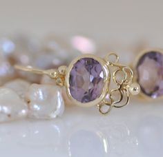 "Unique 14k gold earrings with an oval-faced Amethyst. Handmade beautiful dangle drop earrings, made of 14k yellow solid gold. The light purple Amethyst is shinning with every movement. Amethyst is February birthstone, that makes these earrings a perfect Valentine's day gift :-) You can see a few other gold earrings like this in my shop with a different gemstone, every earring looks unique and special. These earrings are in perfect measurements - not too small and not too big and are easy to dis Elegant Oval Amethyst Earrings, February Birthstone Jewelry, Dangle Earrings Gold, Solid Gold Earrings, Amethyst Gold, Gift For Woman, Birthstone Gifts, February Birthstone, Gold Earring