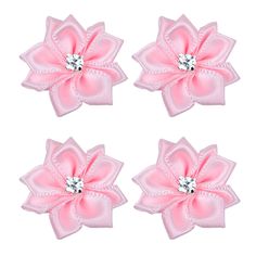 three pink bows with crystal centers