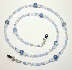 This listing is for a brand new handmade Blue Ice Flake White Opal / Light Sapphire Swarovski Crystal Eyeglass Chain....It is made with 8mm blue ice flake quartz round beads, 6mm Swarovski White Opal Crystal Bicones, 4mm Swarovski Light Sapphire Crystal Bicones, 6/0 Czech Glass Seed Beads in clear, light blue ceylon pastel, matte transparent pale blue....The lobster clasps allows you to easily change out the holders; connect the lobster clasp together and turn the eyeglass chain into a necklace. Thanksgiving Camping, Light Sapphire, Pink Skull, Turquoise Cross, Blue Ice, Eyeglass Chain, Glasses Chain, Opal Crystal, Austrian Crystal