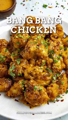 Bang Bang Chicken served on a white plate. Bang Bang Chicken Recipe, Juicy Fried Chicken, Bang Bang Chicken, Bonefish Grill, Spicy Chicken Recipes, Sweet And Spicy Sauce, Spicy Sauce