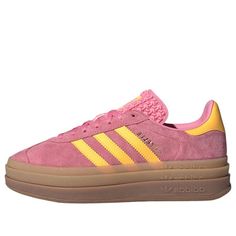 The adidas Gazelle 'Bold Bliss Pink' takes the classic Gazelle silhouette and elevates it with a platform sole. This women's lifestyle shoe features a vibrant Bliss Pink upper with contrasting Spark Pink details. A rubber outsole provides traction, while the platform adds height and a bold look. Whether you're dressing up or down, the Gazelle Bold Bliss Pink is a versatile sneaker that will turn heads. Adidas Platform Sneakers With Boost Midsole, Adidas Platform Sneakers For Spring Streetwear, Pink Platform Sneakers With Translucent Outsole For Sports, Pink Synthetic Platform Sneakers With Contrast Sole, Pink Platform Sneakers With Contrast Sole, Adidas Platform Sneakers With Synthetic Material, Adidas Logo Low-top Synthetic Platform Sneakers, Adidas Sporty Platform Sneakers With Translucent Outsole, Adidas Platform Sneakers For Streetwear