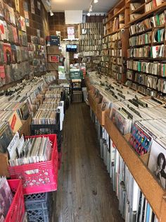 there are many records on the shelves in this store