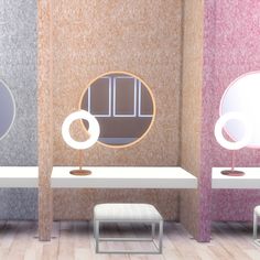 three tables with mirrors and stools on them in a room that has different colors