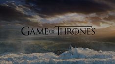 the title for game of thrones is shown in front of an image of snow covered mountains