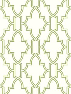 a green and white wallpaper with an intricate design on the back side of it