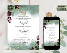 an image of wedding card with flowers on it and a phone next to the card