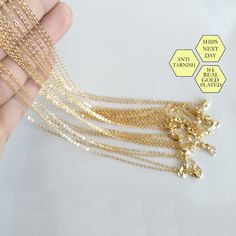 "Item details: Size: * 18\" * 1.6 x 1.8 mm * 235's Chain * Quantity : 10 Pcs NOTE: This listing is for 10 complete necklaces (clasp, closure tag and jump rings) Material: * 16K Gold plated over brass * Diamond cut for extra shine * Real Gold Plated (Not imitation) over Brass (Tarnish Resistant) * Nickel and Lead free (USA standard) Please message us if you have any questions. All packages are packed & shipped with care and love from our warehouse located in California, USA. Thank you!" Gold Necklace Chain, Necklace Clasps, Chain Gold, Brass Pendant, Gold Chain Necklace, So Much Love, Raw Brass, Brass Color, Matte Gold