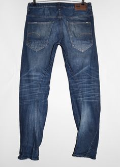 "G-star Raw Arc 3D Tapered blue denim jeans. - Size tag: Please always check measurements before buying. Size W 33 L32 - Measurements (laying flat): Waist: 18\" Outleg: 42\" Inleg: 31\" Thigh: 13.5\" Rise: 11\" Leg opening: 7\" -Wear: /Please see images for details/ Good used condition. Stain on the leg as shown on the picture. - Fabric: Cotton *All of our items are preloved pieces so some signs of natural wear and age are to be expected. Please look through the photos carefully to check if the condition is to your satisfaction. *All efforts are made to show any defects however small imperfections may be missed. In cases that we've missed a major flaw, please remember that we are still human and make mistakes, please contact us first so we can work out any occurred problems together. *We t Jeans G Star, Tapered Jeans, G Star Raw, Blue Denim Jeans, Making Mistakes, Sport Shorts, Black Adidas, Fabric Cotton, Size Tag