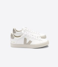 Veja Women's Campo Chromefree Leather Extra White Natural Suede Sneaker is made of ChromeFree leather & suede with a logo V made of suedeLining in jersey (33% organic cotton & 67% recycled polyester)Insole made out of wild rubber and other synthetic materialsSole made of wild rubber from the Amazonian forest (19%)Made in Brazil, in the region of Porto Alegre *** This style runs large. If you are between sizes or sometimes vacillate between one size and another size down a full size. Avai Zapatillas Veja, Veja Trainers, Basket Veja, Veja Sneakers, Naturalizer Shoes, French Brands, Suede Sneakers, Hummel Sneaker, Leather Care