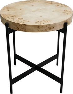 a round wooden table with black metal legs