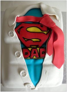 the cake is decorated like a superman symbol