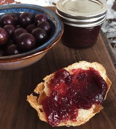 an image of plum jam and bread on the table