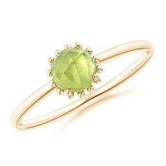 The faceted cabochon peridot looks charming on the sleek 14k yellow gold shank. Intricate bead work forms a striking halo around the olive green gemstone, adding to the overall beauty of this prong set peridot ring. 16th Wedding Anniversary, Peridot Ring, Green Gemstones, 18k Rose Gold, Prong Setting, Bead Work, Heart Ring, Gemstone Jewelry, Olive Green