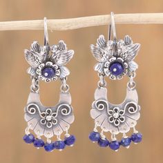 Crafted of sterling silver two loving birds hold a basket of flowers. Designed by the Mazahua Family of Mexico these lavish chandelier earrings feature an array of petite lapis lazuli gems. Coral Earring, Mexican Silver Jewelry, Basket Of Flowers, Whimsical Jewelry, Engagement Earrings, Plants Decor, Unusual Jewelry, Creating Jewelry, Sterling Silver Dangle Earrings