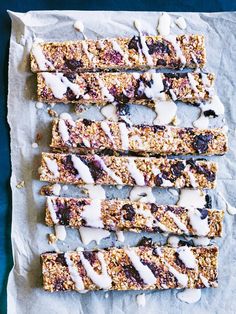 granola bars with blueberries and yogurt drizzled on top