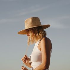 Our much loved, best selling Austin is back with an updated straw weave and in our new Sand colour! ﻿From the desert to the sea, Austin is hand braided from natural raffia straw. Designed to get you from dusty roads to salty seas and everywhere in between. The wide brim ensures sun protection and the chin strap will keep your hat on your head for every adventure. Eco-friendly Straw Hat For Summer Beach, Eco-friendly Woven Straw Hat With Curved Brim, Eco-friendly Woven Straw Hat In Natural Color, Eco-friendly Handwoven Straw Hat For Beach, Raffia Sun Hat, Beige Western-style Woven Straw Hat, Bear Leather, Womens Straw Hats, Beach Festival