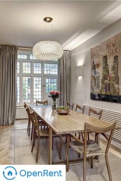 the dining room is clean and ready for guests to use it as an open - concept space