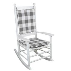 a white rocking chair with a black and white checkered seat cover