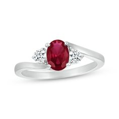 Beguiling in its gorgeous simplicity, this bypass ring makes a wonderful surprise. Crafted in sterling silver An oval-cut lab-created ruby is the splendid centerpiece On each side, a round-cut white lab-created sapphire brings eye-catching sparkle Oval Lab-created Ruby Diamond Ring In White Gold, Silver Ruby Ring With Three Stones In Oval Shape, Oval Lab-created Ruby Ring For Anniversary, Classic Three Stone Lab-created Ruby Jewelry, Oval Lab-created Ruby Diamond Ring In Fine Jewelry Style, Oval Lab-created Ruby Diamond Ring, Classic Three Stone Jewelry With Lab-created Ruby, Three Stone Classic Jewelry With Lab-created Ruby, Classic Three-stone Lab-created Ruby Jewelry