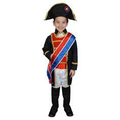 a little boy dressed in a costume