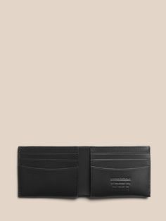 A sleek casual wallet made from sturdy leather, with just enough room to hold your essentials.  Six card slots.  One billfold.  Height: 3. 5" (8. 9cm) Width (folded): 4. 5" (11. 4cm) Leather Billfold, Billfold Wallet, Card Slots, Wallet, Leather