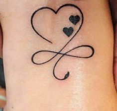 a couple of tattoos on their wrist with hearts in the shape of an infinite sign