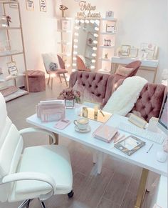 a room filled with lots of furniture and accessories on top of a white table in front of a mirror