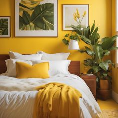 a bedroom with yellow walls, white bedding and green plants on the wall above it