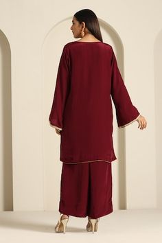 Maroon kurta with aari thread embroidered motifs. Comes with flared pant. - Aza Fashions Red Embroidered Palazzo Set For Diwali, Red Palazzo Set With Straight Kurta And Embroidered Border, Red Palazzo Set With Embroidered Border And Straight Kurta, Bollywood Style Red Palazzo Set With Embroidered Border, Red Bollywood Palazzo Set With Embroidered Border, Elegant Red Palazzo Set With Embroidered Border, Red Palazzo Set With Embroidered Border For Eid, Red Straight Kurta With Embroidered Border, Unstitched Red Set With Embroidered Border