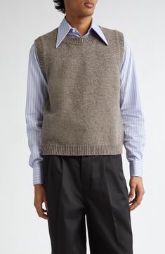 Soft Italian wool offers luxe warmth and comfort in this marled sweater-vest featuring a signature four-stitch moniker at the nape. Crewneck Ribbed cuffs and hem 100% wool Dry clean Made in Italy Designer Clothing Brown Sweater Vest Outfit Men, Classic Sleeveless Wool Top, Classic Wool Sweater Vest For Layering, Fitted Wool Sweater Vest For Layering, Classic Cashmere Sweater Vest For Fall, Classic Cashmere Sweater Vest For Layering, Classic Winter Vest For Layering, Casual Wool Sweater Vest For Work, Fitted Cashmere Vest For Winter