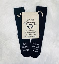 two pairs of socks with the words for my groom and i cant wait to meet you