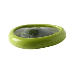 an image of a green bowl that is filled with something on the inside and in the outside